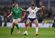 9 April 2024; Jessica Carter of England and Heather Payne of Republic of Ireland during the UEFA Women's European Championship qualifying group A match between Republic of Ireland and England at Aviva Stadium in Dublin. Photo by Ben McShane/Sportsfile