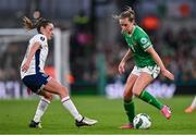 9 April 2024; Heather Payne of Republic of Ireland and Ella Toone of England during the UEFA Women's European Championship qualifying group A match between Republic of Ireland and England at Aviva Stadium in Dublin. Photo by Ben McShane/Sportsfile