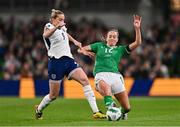 9 April 2024; Alessia Russo of England is tackled by Anna Patten of Republic of Ireland during the UEFA Women's European Championship qualifying group A match between Republic of Ireland and England at Aviva Stadium in Dublin. Photo by Ben McShane/Sportsfile