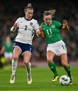 9 April 2024; Katie McCabe of Republic of Ireland and Lucy Bronze of England during the UEFA Women's European Championship qualifying group A match between Republic of Ireland and England at Aviva Stadium in Dublin. Photo by Ben McShane/Sportsfile