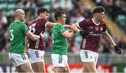 6 April 2024; Matt Moynihan, left, and Daire Rooney of London tussle with Robert Finnerty and Cillian Ó Curraoin of Galway during the Connacht GAA Football Senior Championship quarter-final match between London and Galway at McGovern Park in Ruislip, England. Photo by Brendan Moran/Sportsfile
