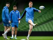 12 April 2024; Ciarán Frawley, right, with Harry Byrne and Ross Byrne during a Leinster Rugby captain's run at the Aviva Stadium in Dublin. Photo by Harry Murphy/Sportsfile