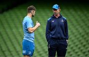 12 April 2024; Head coach Leo Cullen speaks with Ross Byrne during a Leinster Rugby captain's run at the Aviva Stadium in Dublin. Photo by Harry Murphy/Sportsfile