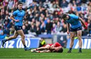 31 March 2024; Brian Fenton of Dublin and Eunan Mulholland of Derry during the Allianz Football League Division 1 Final match between Dublin and Derry at Croke Park in Dublin. Photo by Piaras Ó Mídheach/Sportsfile