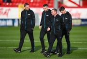 12 April 2024; Match officials walk the pitch before the SSE Airtricity Men's Premier Division match between Shelbourne and Bohemians at Tolka Park in Dublin. Photo by Stephen McCarthy/Sportsfile