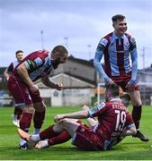 12 April 2024; Warren Davis of Drogheda United, hidden, celebrates with teammates after scoring their side's first goal during the SSE Airtricity Men's Premier Division match between Drogheda United and Derry City at Weavers Park in Drogheda, Louth. Photo by Ramsey Cardy/Sportsfile