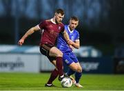 12 April 2024; Karl O'Sullivan of Galway United in action against Darragh Power of Waterford during the SSE Airtricity Men's Premier Division match between Waterford and Galway United at Regional Sports Centre in Waterford. Photo by Michael P Ryan/Sportsfile