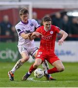 12 April 2024; John Martin of Shelbourne in action against Jevon Mills of Bohemians during the SSE Airtricity Men's Premier Division match between Shelbourne and Bohemians at Tolka Park in Dublin. Photo by Stephen McCarthy/Sportsfile