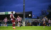 12 April 2024; Will Patching of Derry City shoots to score his side's second goal during the SSE Airtricity Men's Premier Division match between Drogheda United and Derry City at Weavers Park in Drogheda, Louth. Photo by Ramsey Cardy/Sportsfile