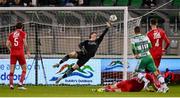 12 April 2024; Sligo Rovers goalkeeper Ed McGinty concedes a goal, scored by Graham Burke of Shamrock Rovers, right, during the SSE Airtricity Men's Premier Division match between Shamrock Rovers and Sligo Rovers at Tallaght Stadium in Dublin. Photo by Seb Daly/Sportsfile