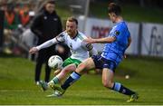 12 April 2024; Jack Doherty of Cork City in action against Donal Higgins of UCD during the SSE Airtricity Men's First Division match between UCD and Cork City at UCD Bowl in Belfield, Dublin. Photo by Shauna Clinton/Sportsfile