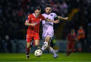 12 April 2024; Liam Burt of Shelbourne is tackled by Jordan Flores of Bohemians during the SSE Airtricity Men's Premier Division match between Shelbourne and Bohemians at Tolka Park in Dublin. Photo by Stephen McCarthy/Sportsfile