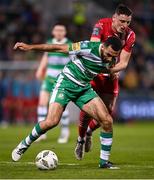 12 April 2024; Roberto Lopes of Shamrock Rovers in action against Reece Hutchinson of Sligo Rovers during the SSE Airtricity Men's Premier Division match between Shamrock Rovers and Sligo Rovers at Tallaght Stadium in Dublin. Photo by Seb Daly/Sportsfile