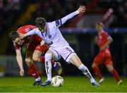 12 April 2024; Paddy Kirk of Bohemians is tackled by John Martin of Shelbourne during the SSE Airtricity Men's Premier Division match between Shelbourne and Bohemians at Tolka Park in Dublin. Photo by Stephen McCarthy/Sportsfile