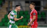 12 April 2024; Aaron Greene of Shamrock Rovers, left, celebrates in front of John Ross Wilson of Sligo Rovers after scoring his side's second goal during the SSE Airtricity Men's Premier Division match between Shamrock Rovers and Sligo Rovers at Tallaght Stadium in Dublin. Photo by Seb Daly/Sportsfile