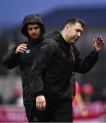 12 April 2024; Dundalk coach Brian Gartland walks away after a conversation with fourth official Robert Harvey, left, during the SSE Airtricity Men's Premier Division match between Dundalk and St Patrick's Athletic at Oriel Park in Dundalk, Louth. Photo by Piaras Ó Mídheach/Sportsfile