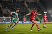 12 April 2024; Ollie Denham of Sligo Rovers in action against Johnny Kenny of Shamrock Rovers during the SSE Airtricity Men's Premier Division match between Shamrock Rovers and Sligo Rovers at Tallaght Stadium in Dublin. Photo by Seb Daly/Sportsfile