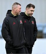 12 April 2024; Dundalk coach Brian Gartland, right, and Dundalk interim head coach Liam Burns before the SSE Airtricity Men's Premier Division match between Dundalk and St Patrick's Athletic at Oriel Park in Dundalk, Louth. Photo by Piaras Ó Mídheach/Sportsfile