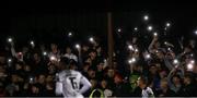 12 April 2024; Dundalk supporters shine the lights on their phones during the SSE Airtricity Men's Premier Division match between Dundalk and St Patrick's Athletic at Oriel Park in Dundalk, Louth. Photo by Piaras Ó Mídheach/Sportsfile