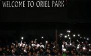 12 April 2024; Dundalk supporters shine the lights on their phones during the SSE Airtricity Men's Premier Division match between Dundalk and St Patrick's Athletic at Oriel Park in Dundalk, Louth. Photo by Piaras Ó Mídheach/Sportsfile