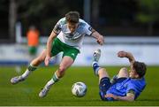 12 April 2024; Cian Bargary of Cork City is tackled by Adam Wells of UCD during the SSE Airtricity Men's First Division match between UCD and Cork City at UCD Bowl in Belfield, Dublin. Photo by Shauna Clinton/Sportsfile