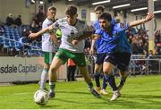 12 April 2024; Harry Nevin of Cork City in action against Sean Brennan of UCD during the SSE Airtricity Men's First Division match between UCD and Cork City at UCD Bowl in Belfield, Dublin. Photo by Shauna Clinton/Sportsfile