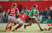 13 April 2024; Katie Corrigan of Ireland is tackled by Abbie Fleming of Wales during the Women's Six Nations Rugby Championship match between Ireland and Wales at Virgin Media Park in Cork.  Photo by Brendan Moran/Sportsfile