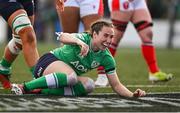 13 April 2024; Eve Higgins of Ireland, celebrates after scoring her side's second try during the Women's Six Nations Rugby Championship match between Ireland and Wales at Virgin Media Park in Cork. Photo by Brendan Moran/Sportsfile