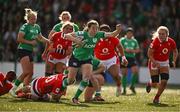 13 April 2024; Eve Higgins of Ireland is tackled by Lleucu George of Wales during the Women's Six Nations Rugby Championship match between Ireland and Wales at Virgin Media Park in Cork. Photo by Brendan Moran/Sportsfile