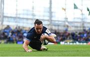 13 April 2024; James Lowe of Leinster dives over to score his side's first try during the Investec Champions Cup quarter-final match between Leinster and La Rochelle at the Aviva Stadium in Dublin. Photo by Harry Murphy/Sportsfile