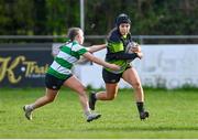 13 April 2024; Sarah Boyce Donohoe of Portdara in action against Muireann Cawley of Naas during the Leinster Rugby Girl's U18 semi-final match between Naas and Portdara at Naas RFC in Kildare. Photo by Tyler Miller/Sportsfile