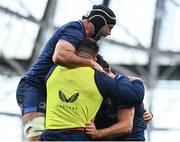 13 April 2024; James Lowe of Leinster, right, celebrates with teammates including Caelan Doris after scoring his side's first try during the Investec Champions Cup quarter-final match between Leinster and La Rochelle at the Aviva Stadium in Dublin. Photo by Harry Murphy/Sportsfile