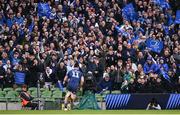 13 April 2024; Leinster supporters celebrate as James Lowe runs in their side's first try during the Investec Champions Cup quarter-final match between Leinster and La Rochelle at the Aviva Stadium in Dublin. Photo by Ramsey Cardy/Sportsfile
