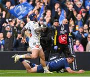 13 April 2024; James Lowe of Leinster scores his side's first try despite the efforts of Jack Nowell of La Rochelle  during the Investec Champions Cup quarter-final match between Leinster and La Rochelle at the Aviva Stadium in Dublin. Photo by Sam Barnes/Sportsfile