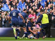 13 April 2024; James Lowe of Leinster, centre, celebrates with Caelan Doris, 8 ,and Andrew Porter, second left, after scoring their side's first try during the Investec Champions Cup quarter-final match between Leinster and La Rochelle at the Aviva Stadium in Dublin. Photo by Sam Barnes/Sportsfile
