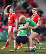 13 April 2024; Katie Corrigan of Ireland, celebrates with teammate Neve Jones, right, after scoring their side's fourth try during the Women's Six Nations Rugby Championship match between Ireland and Wales at Virgin Media Park in Cork. Photo by Brendan Moran/Sportsfile