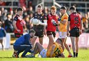 13 April 2024; Dominic McEnhill of Antrim is treated for an injury during the Ulster GAA Football Senior Championship quarter-final match between Down and Antrim at Páirc Esler in Newry, Down. Photo by Ben McShane/Sportsfile