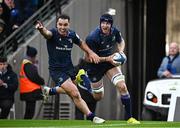 13 April 2024; Ryan Baird of Leinster celebrates with teammate James Lowe on his way to scoring his side's third try during the Investec Champions Cup quarter-final match between Leinster and La Rochelle at the Aviva Stadium in Dublin. Photo by Harry Murphy/Sportsfile