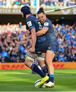 13 April 2024; Ryan Baird of Leinster, left, celebrates with James Lowe after scoring their side's third try during the Investec Champions Cup quarter-final match between Leinster and La Rochelle at the Aviva Stadium in Dublin. Photo by Ramsey Cardy/Sportsfile