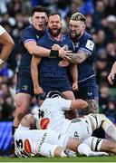 13 April 2024; Jamison Gibson-Park of Leinster celebrates winning a penalty with teammates Dan Sheehan and Andrew Porter during the Investec Champions Cup quarter-final match between Leinster and La Rochelle at the Aviva Stadium in Dublin. Photo by Harry Murphy/Sportsfile