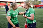 13 April 2024; Player of the match Aoife Wafer of Ireland is congratulated by teammate Sadhbh McGrath, left, after the Women's Six Nations Rugby Championship match between Ireland and Wales at Virgin Media Park in Cork. Photo by Brendan Moran/Sportsfile