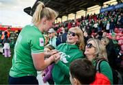 13 April 2024; Sam Monaghan of Ireland celebrates with her family after the Women's Six Nations Rugby Championship match between Ireland and Wales at Virgin Media Park in Cork. Photo by Brendan Moran/Sportsfile