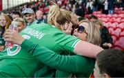 13 April 2024; Sam Monaghan of Ireland celebrates with her family after the Women's Six Nations Rugby Championship match between Ireland and Wales at Virgin Media Park in Cork. Photo by Brendan Moran/Sportsfile