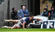 13 April 2024; James Lowe of Leinster dives over to score his side's fifth try despite the tackle of Jack Nowell of La Rochelle  during the Investec Champions Cup quarter-final match between Leinster and La Rochelle at the Aviva Stadium in Dublin. Photo by Harry Murphy/Sportsfile