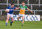 13 April 2024; Damon Larkin of Laois in action against Peter Cunningham of Offaly during the Leinster GAA Football Senior Championship quarter-final match between Offaly and Laois at Laois Hire O’Moore Park in Portlaoise, Laois. Photo by Piaras Ó Mídheach/Sportsfile