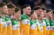 13 April 2024; Nathan Poland of Offaly, centre, during the playing of Amhrán na bhFiann before the Leinster GAA Football Senior Championship quarter-final match between Offaly and Laois at Laois Hire O’Moore Park in Portlaoise, Laois. Photo by Piaras Ó Mídheach/Sportsfile