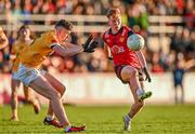 13 April 2024; Oisin Savage of Down in action against Eunan Walsh of Antrim during the Ulster GAA Football Senior Championship quarter-final match between Down and Antrim at Páirc Esler in Newry, Down. Photo by Ben McShane/Sportsfile