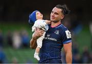 13 April 2024; James Lowe of Ireland and his son Nico after his side's victory in the Investec Champions Cup quarter-final match between Leinster and La Rochelle at the Aviva Stadium in Dublin. Photo by Sam Barnes/Sportsfile