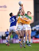 13 April 2024; Jack Lacey of Laois in action against Offaly players Ruairí McNamee and Jack Bryant, right, during the Leinster GAA Football Senior Championship quarter-final match between Offaly and Laois at Laois Hire O’Moore Park in Portlaoise, Laois. Photo by Piaras Ó Mídheach/Sportsfile