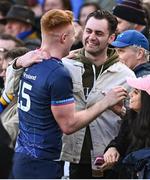 13 April 2024; Ciarán Frawley of Leinster with former Leinster player Conor O'Brien after the Investec Champions Cup quarter-final match between Leinster and La Rochelle at the Aviva Stadium in Dublin. Photo by Ramsey Cardy/Sportsfile